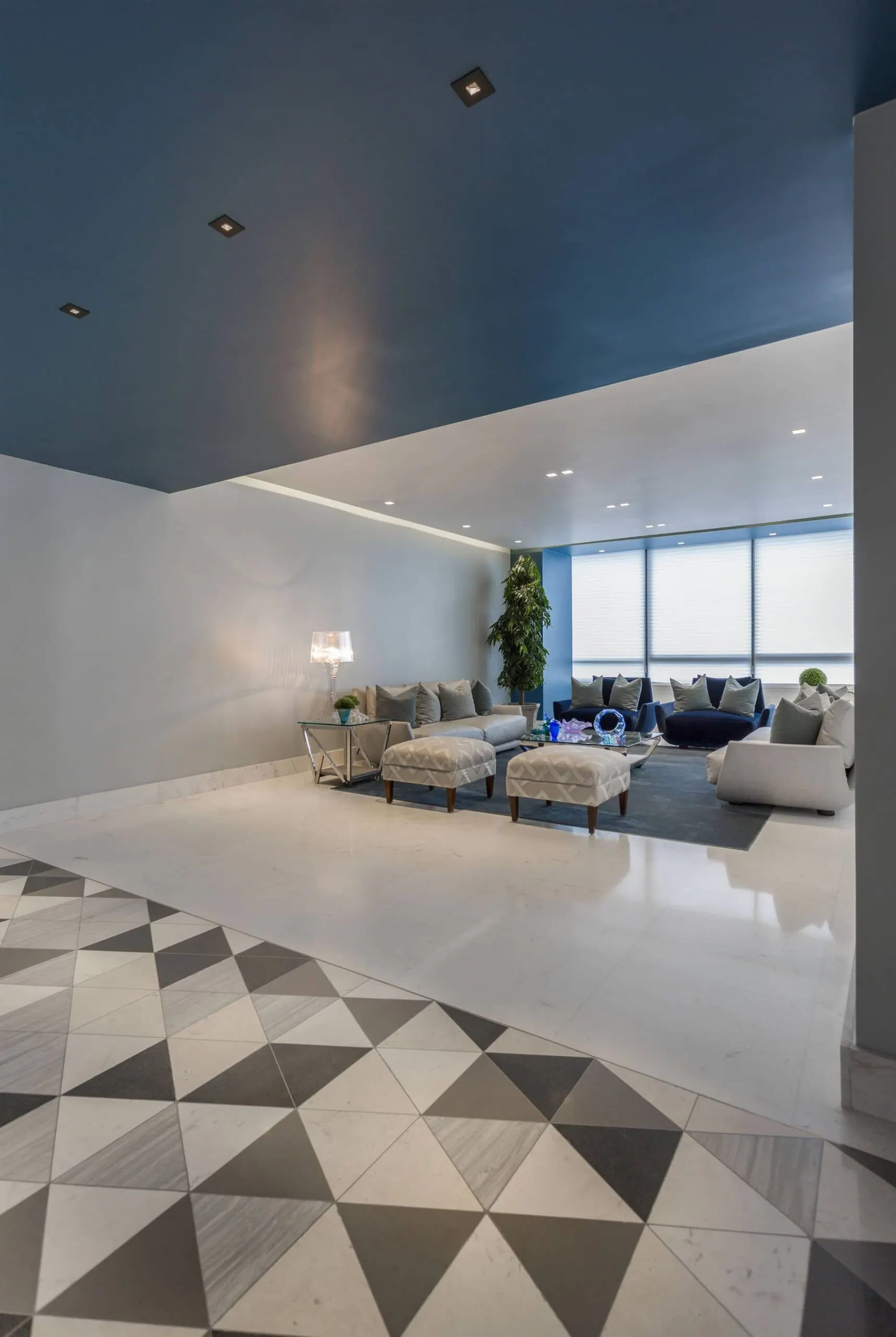 An interior where furniture and lighting are resolved together